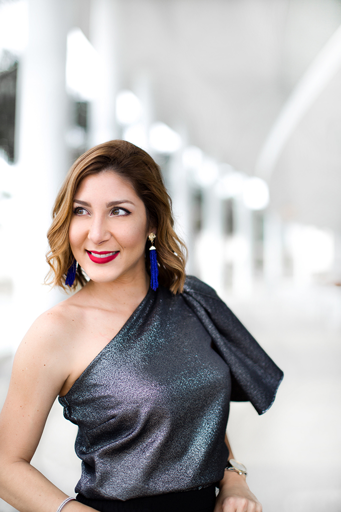 Blame-it-on-Mei-Miami-Fashion-Blogger-2016-Holiday-Outfit-NYE-Look-Metallic-Asymetric-Top-with-Ruffle-Joggers-Patent-Iriza-Louboutin-Beaded-Clutch-Tassel-Earrings-Curls-Short-Hair