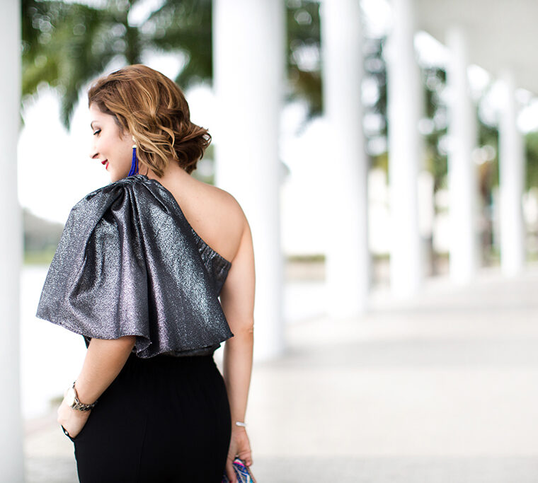 Blame-it-on-Mei-Miami-Fashion-Blogger-2016-Holiday-Outfit-NYE-Look-Metallic-Asymetric-Top-with-Ruffle-Joggers-Patent-Iriza-Louboutin-Beaded-Clutch-Tassel-Earrings-Curls-Short-Hair