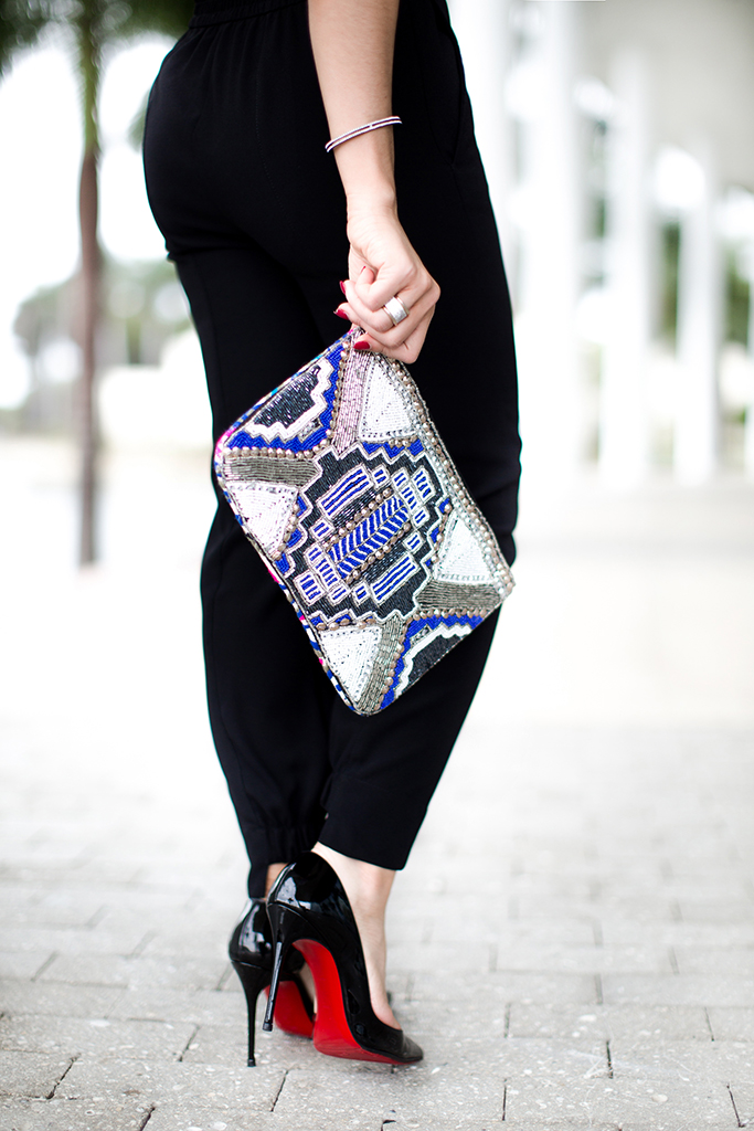 Blame-it-on-Mei-Miami-Fashion-Blogger-2016-Holiday-Outfit-NYE-Look-Metallic-Asymetric-Top-with-Ruffle-Joggers-Patent-Iriza-Louboutin-Beaded-Clutch-Tassel-Earrings-Curls-Short-Hair