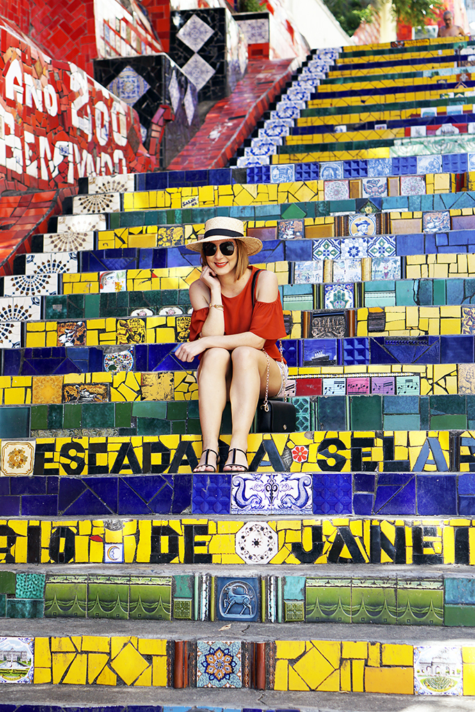 Blame-it-on-Mei-Miami-Fashion-Travel-Blogger-2017-Rio-de-Janeiro-Aqueduct-Travel-Look-Casual-Outfit-Straw-Boater-Hat-Cold-Shoulder-Top-Stripe-Shorts-Tassel-Earrings
